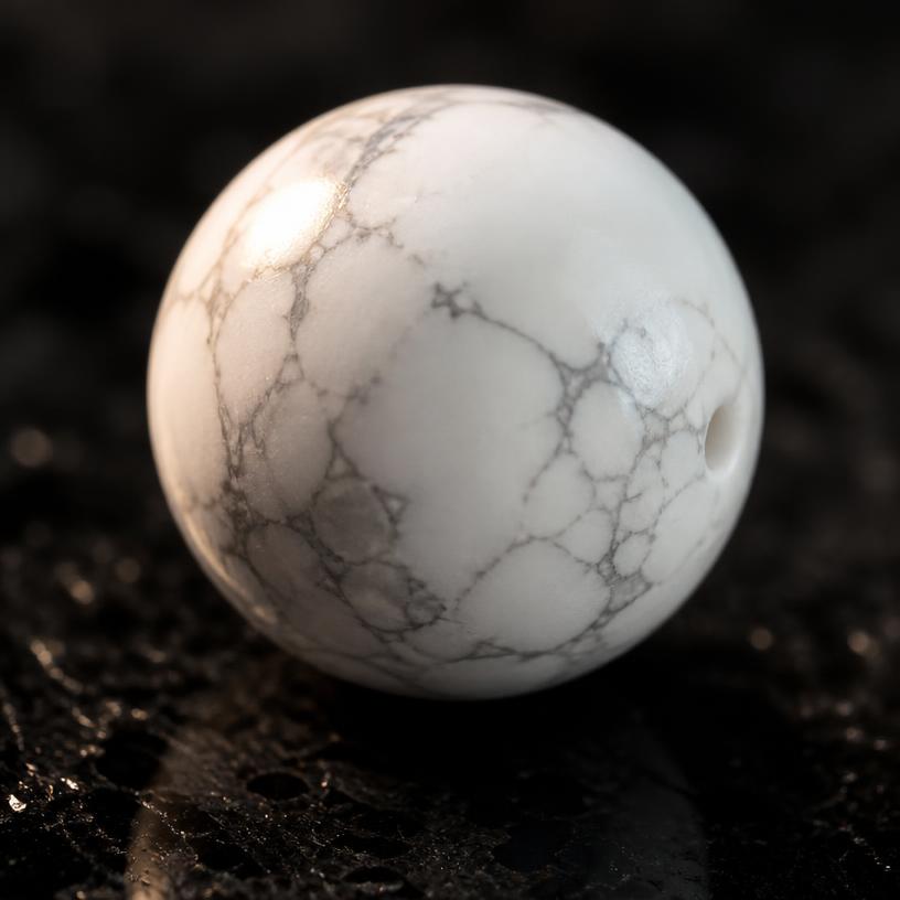 Howlite — Chalk white marbled with fine grey veining.
